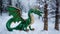 Green dragon made of wood on the background of snowy forest. Green Christmas dragon in the woods, generated AI