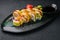 Green dragon sushi roll with shrimp
