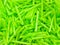 Green drinking straws background