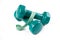 Green dumbell with measuring tape