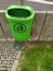 Green dustbin for waste and garbage in urban cities against pollution and for environmental friendly garbage collection keeps the