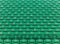 Green empty stadium folding seats background