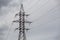 Green energy: high tension power towers against the sky