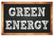 GREEN ENERGY words on black wooden frame school blackboard