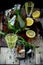 Green estragon lemonade pitcher a wooden table