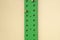 Green exercise peg board with  pegs