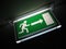Green Exit Sign on Ceiling