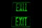 Green Exit Sign Reflection on Black