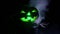 Green eyes pumpking in Halloween Horror Scene