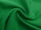 Green fabric surface texture. Matted fabric background