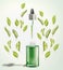 Green facial Serum or oil bottle with pipette and green leaves. Modern skin care and beauty