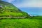 Green fields along Slea Head coastal drive, Dingle Peninsula, County Kerry, Ireland