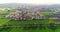 Green fields around a small town. Beautiful European landscape. Small European city aerial view. german village aerial