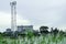 Green fields with modern factory buidling for green industry concept