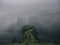 green foggy cliffs in Western Fjords