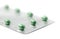 Green Foil Packaged Pills on White