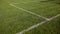 Green football pitch on a sunny day