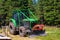 Green Forestry tractor with Roll cage and plough