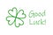 Green four-leaf clover and good luck typography