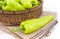 Green fresh capsicum vegetable in basket