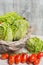Green fresh roma lettuce salad leaves and roma mini tomatoes