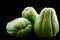 Green fresh vegetarian chayote. organic food concept
