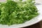 Green frillies lettuce on white plate
