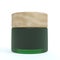 Green frosted glass cosmetic cream jar with wooden lid, beauty and care product packaging 3D render mockup