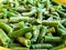 Green frozen beans. Closeup frozen cut green french bean, haricot vert. Vegetable food background.
