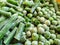 Green frozen beans and peas. Closeup frozen cut green french bean, haricot vert. Vegetable food background, healthy vegetarian