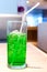 Green fruit flavor soft drinks whit soda water