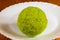 Green fruit of maclura pomifera, osage orange, horse apple, adam