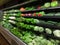 A green full and fresh produce area in a store