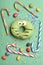 Green funny surprised donut