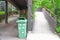 Green Garbage Bin, Plastic Container, near walk way
