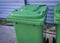 Green garbage containers. Disposal during a pandemic. Sanitary standards