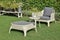 Green garden with an outdoor furniture lounge group