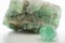 Green gemstone natural mineral fluoride or green beryl isolated