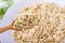 Green germinated buckwheat on a wooden spoon. Raw buckwheat. Useful food from buckwheat sprouts