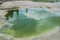 Green geyser pool in Yellowstone