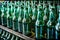 Green glass bottles from bottling plant, industries, food & beverages