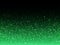 Green glitter particles light splatter background