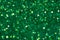 Green glitter texture christmas abstract background. Shiny wrapping paper texture, greeting card design element