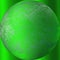Green glowing ball with hazy objects.