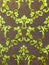 Green gold monograms on a brown background