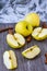 Green golden apples or Granny smith with cinnamon sticks on wooden background, preparing food, dessert