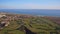 Green golf courses by the sea. Salgados beach. Portugal, Albufeira. Aerial view.