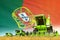 Green grain agricultural combine harvester on field with Portugal flag background, food industry concept - industrial 3D