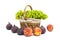 Green grapes in a basket, peaches and figs on a white background