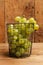 Green grapes in a wire basket